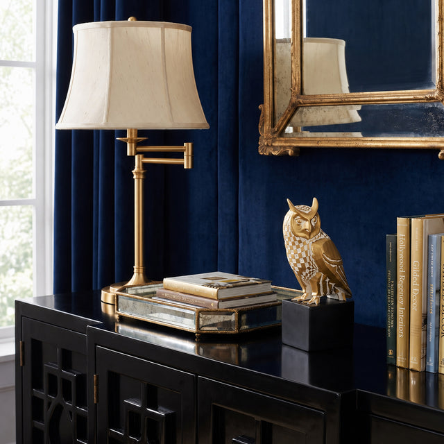 Checkered Owl Sculpture On Black Cabinet