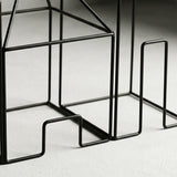 Closeup L metal wire house
