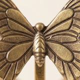 Closeup carved butterfly metal detail