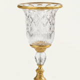 Closeup carved crystal gilded urn