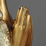 Closeup clasped hands sculpture