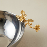 Closeup gold flower metal bowl
