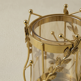 Closeup gold leaf metal vase frame