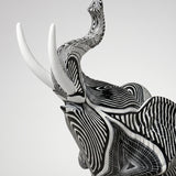 Closeup head shot white tusk elephant sculpture