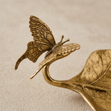 Closeup metallic butterfly leaf tray