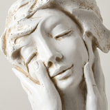 Closeup relaxed woman bust carving