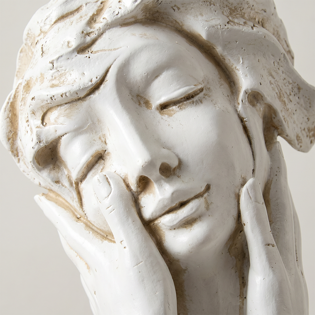 Closeup relaxed woman bust carving