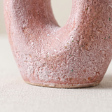 Closeup rough pink ceramic surface