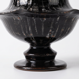 Closeup textured speckled vase body