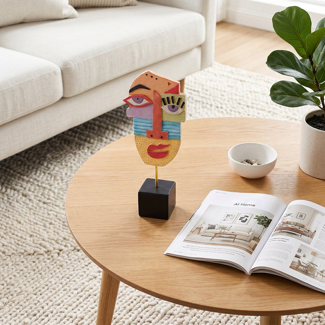 Colorful Face Sculpture On Round Table