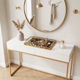 Decorative tray on white console table
