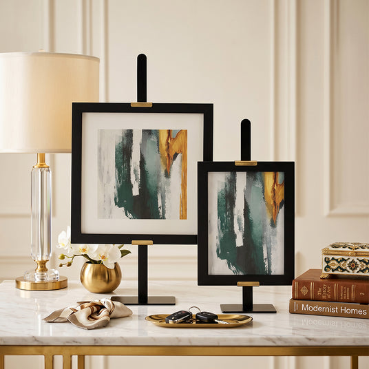 Dual frames on marble tabletop
