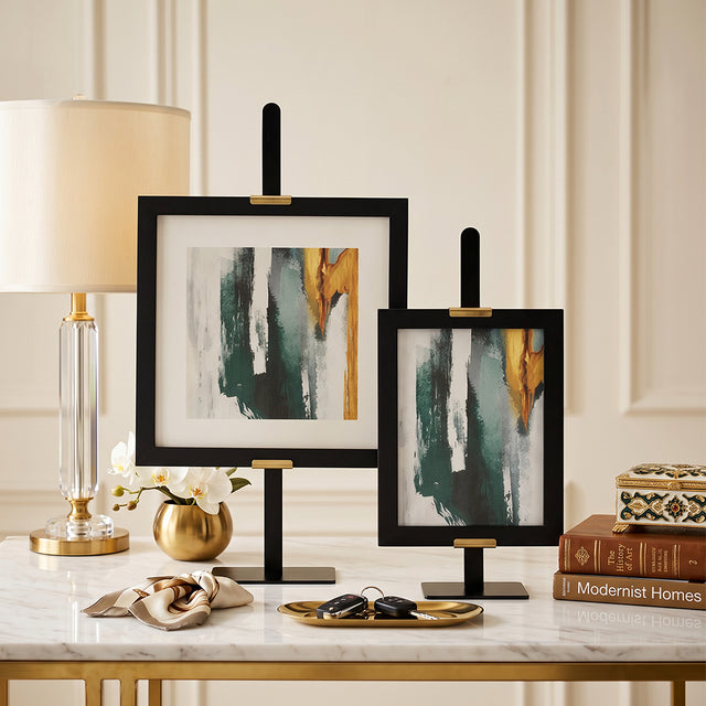 Dual frames on marble tabletop
