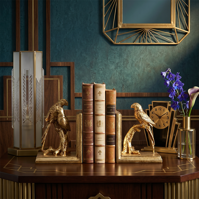 Eagle bookends on vintage desk
