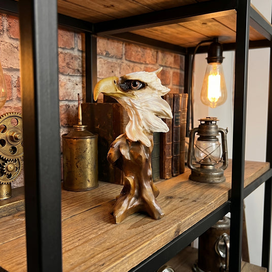 Eagle bust inside industrial metal glass display shelf