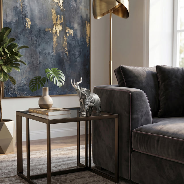 Elephant figurine on glass living room coffee table