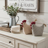 Fabric chickens onwhite sideboard
