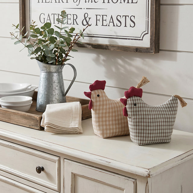 Fabric chickens onwhite sideboard
