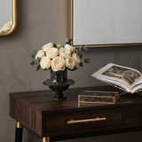 Flared rim ceramic vase on rustic dark sideboard