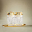 Glass Bathroom Dispenser Set on the table