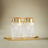 Glass Bathroom Dispenser Set on the table