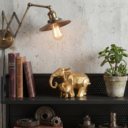 Gold Elephant Decor On Black Shelf