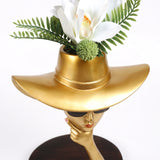 Gold Hat Vase And Face Close Up