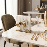 Gold Rose Napkin Holder On Marble Table