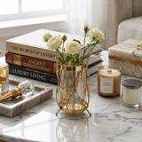 Gold glass vase on marble tabletop