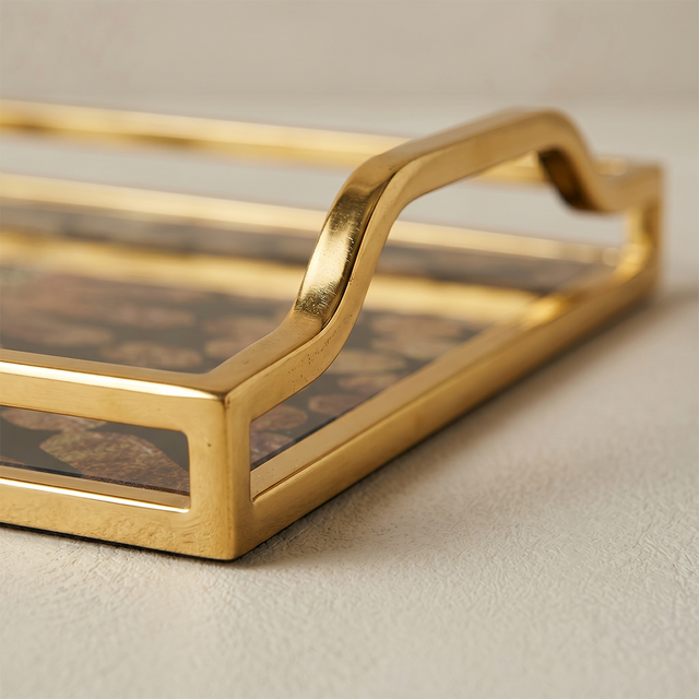Gold handle metal tray detail