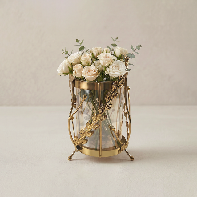 Gold leaf glass vase with flowers