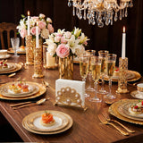 Gold peacock stand on wedding banquet table