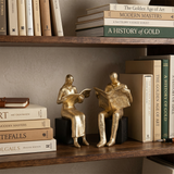 Golden Reader Sculpture – Polyresin Abstract Figurine, Antique Gold Finish & Black Base, Home Office Bookshelf Décor, Reading Nook Accent