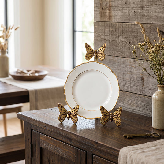 Golden butterfly stand on rustic wood sideboard