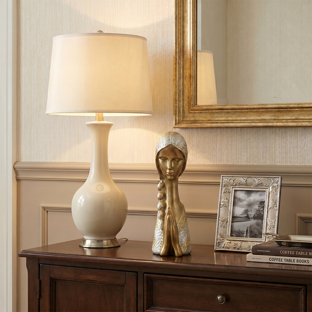 Golden figure on bedroom nightstand