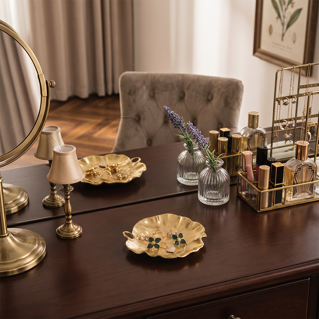 Golden lotus tray on bedroom nightstand