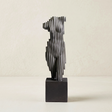 Gray ribbed torso statue square base