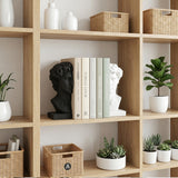 Greekhead bookends inside light oak open bookcase
