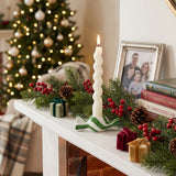 Green Candy Candle Holder On Christmas Mantel