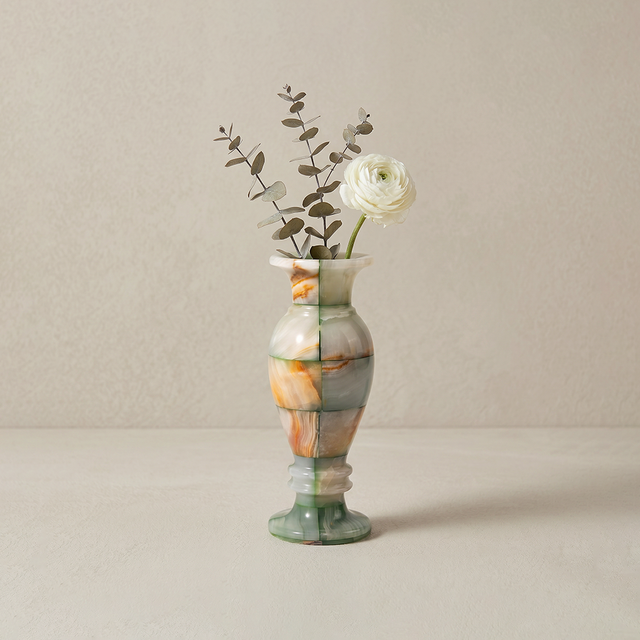 Green vein onyx pedestal vase with dried blooms