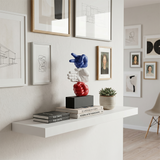Hand Gesture Figurine On Books