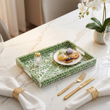 Leaf tray with desserts on dining table