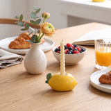 Lemon Candle Holder On Breakfast Table