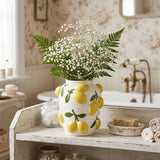 Lemon Vase With Baby Breath In Bathroom