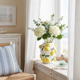 Lemon Vase With White Hydrangeas On Windowsill