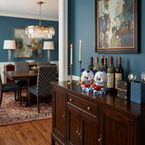 Lucky child statues on dining side cabinet