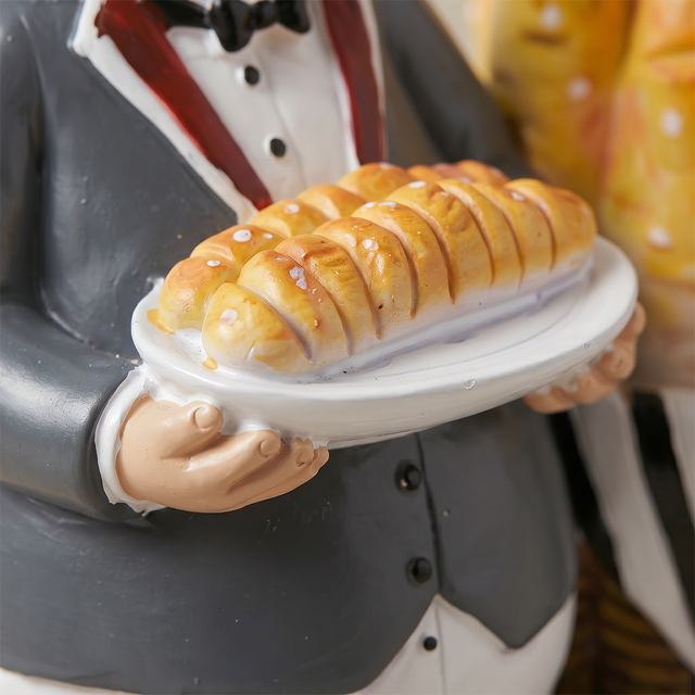 Macro shot chef holding bread plate