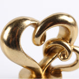 Metallic Gold Heart Surface Close Up