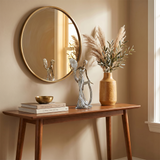 Metallic statue on entryway console table