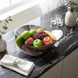Modern fruitbowl with fresh fruits
